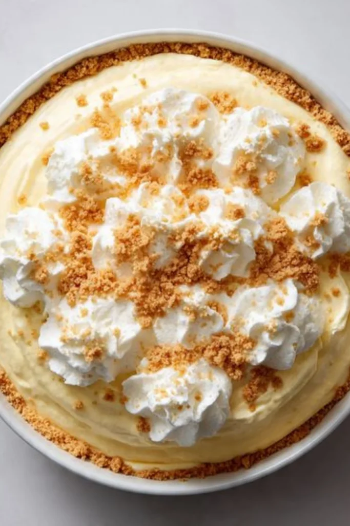 Delicious and fluffy cheesecake fluff dessert in a glass with berries