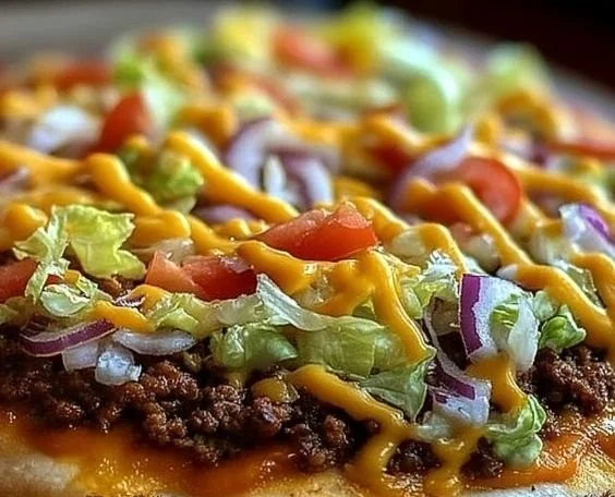Delicious Big Mac Pizza topped with burger ingredients and cheese