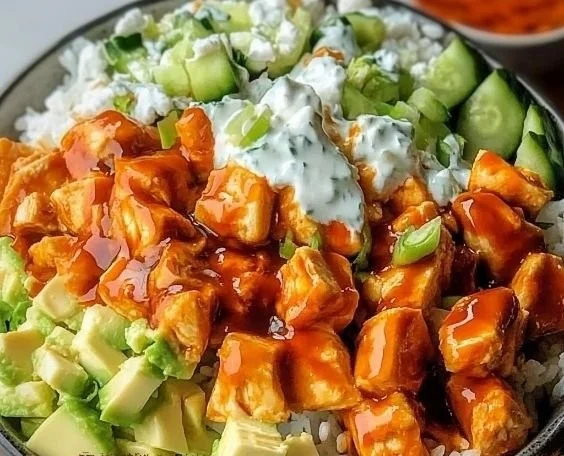 Delicious Buffalo Chicken Bowl topped with fresh ingredients and spices