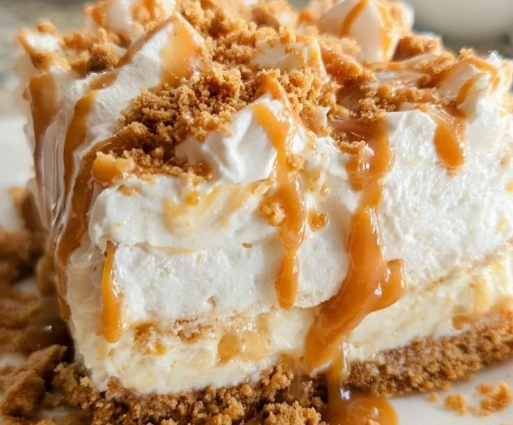 A delicious serving of Butterscotch Delight dessert topped with caramel sauce.