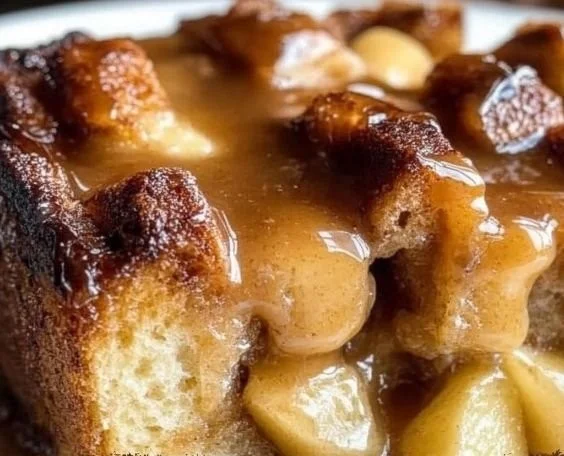 Delicious Caramel Apple Bread Pudding with warm caramel sauce and apple slices