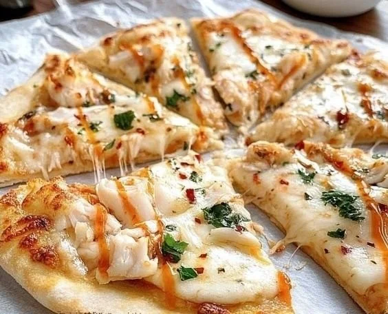 Delicious Crab Rangoon Pizza topped with cream cheese and crab meat