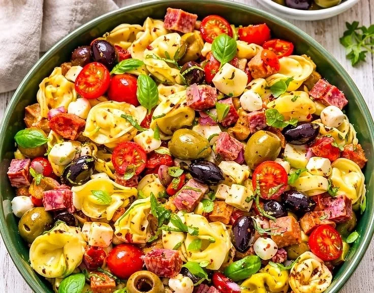 Colorful Antipasto Tortellini Pasta Salad with fresh vegetables and dressing
