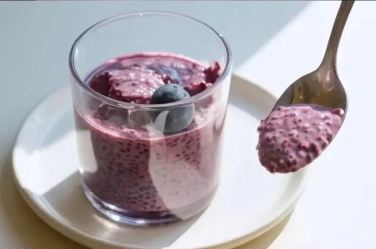 Delicious blueberry chia seed pudding served in a bowl with fresh blueberries