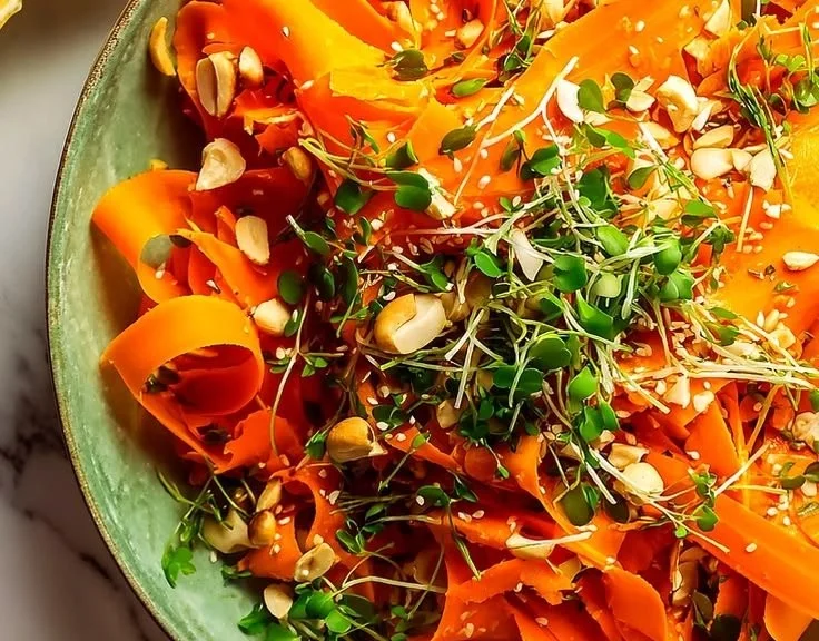 Fresh carrot salad with vibrant colors and healthy ingredients