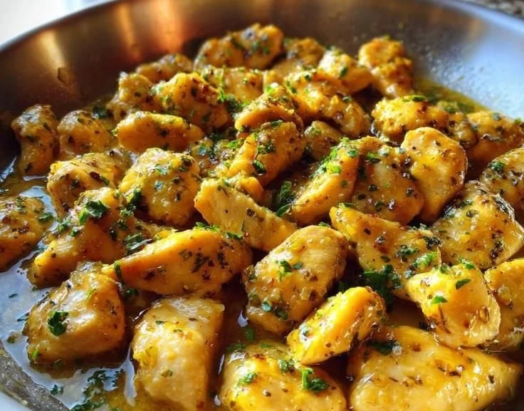 Garlic Lemon Chicken Skillet with fresh herbs and lemon slices