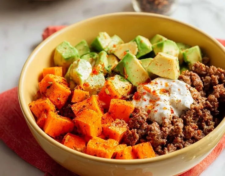 Homemade ground beef cottage cheese bowl with fresh ingredients.