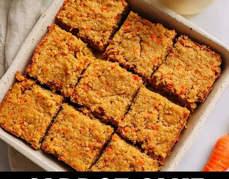 Slice of perfect carrot cake without frosting on a plate