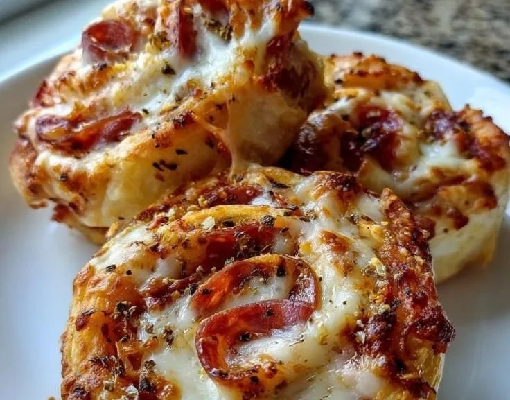 Delicious Pizza Pinwheels filled with cheese and pepperoni ready to be served.
