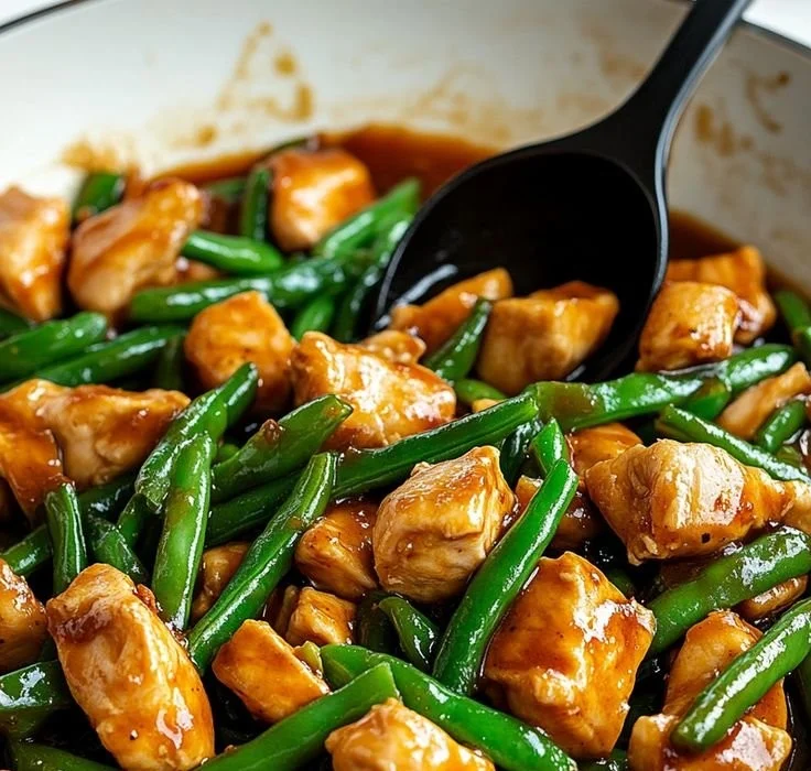Quick chicken breast dish with green beans served on a plate