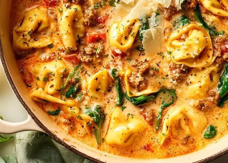 Delicious bowl of Rich Italian Sausage Tortellini Soup with fresh ingredients
