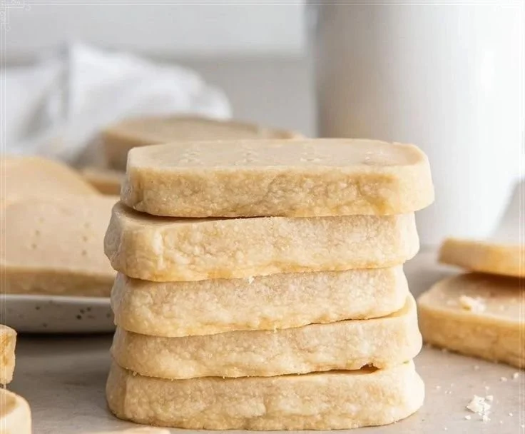 Homemade Scottish shortbread cookies arranged on a plate.