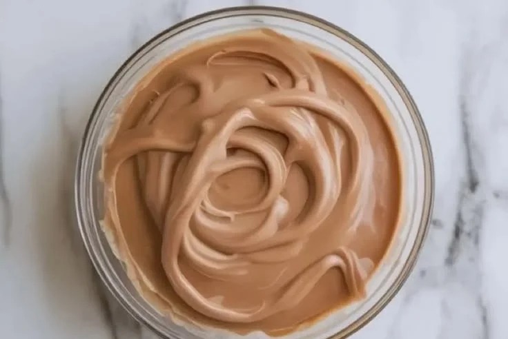 Delicious Baileys cake filling in a chocolate cake layer