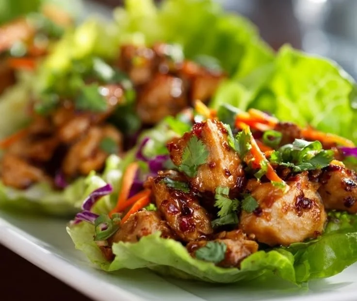 P.F. Chang's style chicken lettuce wraps served with dipping sauce