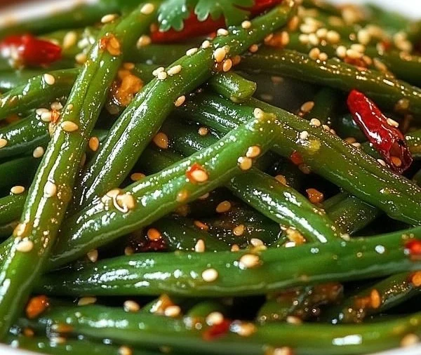 Delicious Chinese buffet green beans served on a plate.