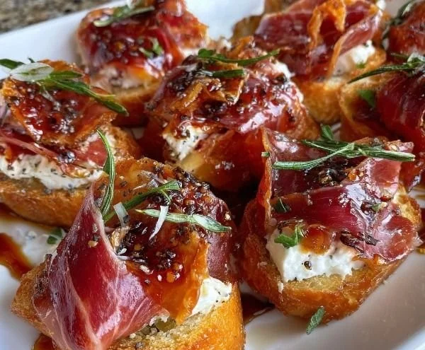 Crispy prosciutto appetizers topped with Boursin cheese and honey