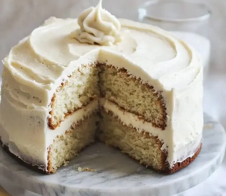 Decadent banana cake with spiced vanilla buttercream topping