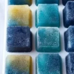A tray of colorful smoothie cubes ready to blend for healthy drinks