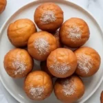 Homemade gluten free donut holes on a plate