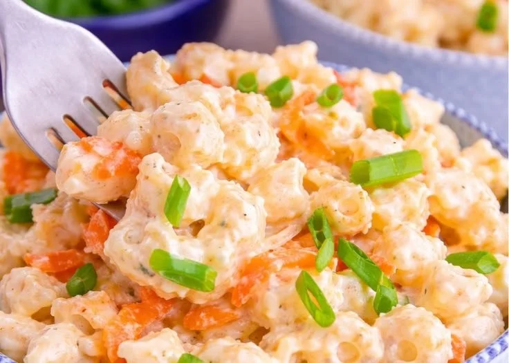 Bowl of Hawaiian Macaroni Salad with vibrant vegetables and creamy dressing