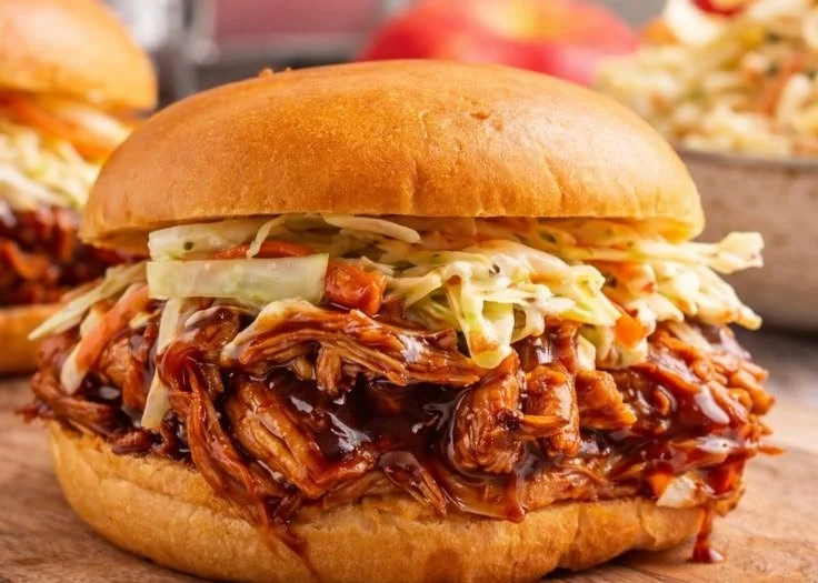 Healthy BBQ Pulled Chicken served with fresh vegetables