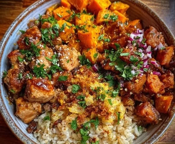 Delicious Maple Dijon Chicken served in a sweet potato bowl