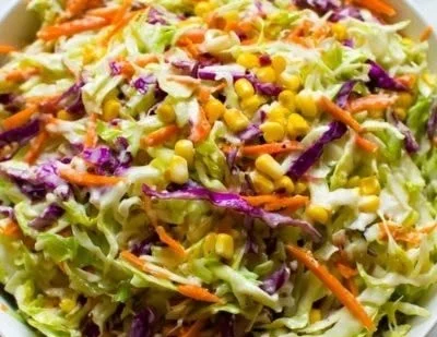 Bowl of colorful Mexican coleslaw with fresh ingredients and spices