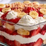 Delicious Strawberry Crunch and Banana Pudding Cheesecakes beautifully presented.