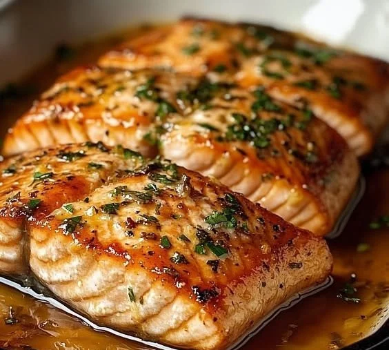 Delicious baked salmon served with vegetables on a plate