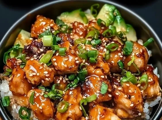 Delicious Bang Bang Chicken Bowl garnished with fresh vegetables