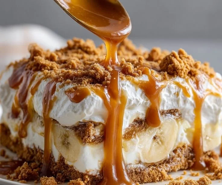 Delicious Biscoff banana pudding drizzled with caramel in a dessert bowl