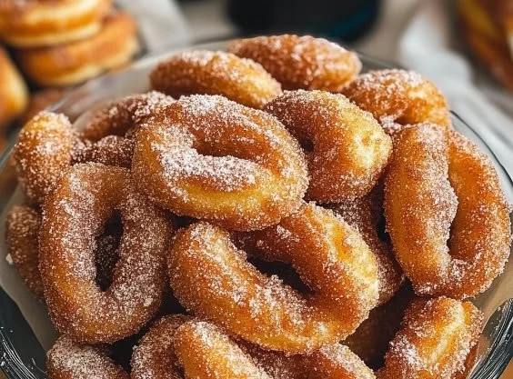 Delicious cinnamon sugar donuts with a unique twist, perfect for dessert lovers.
