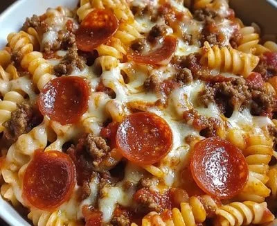 Crockpot Pizza Pasta dish garnished and ready to serve.