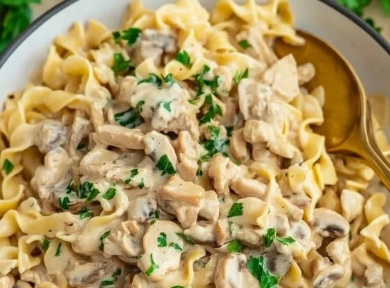 Delicious Ground Turkey Stroganoff served in a bowl with herbs and spices.