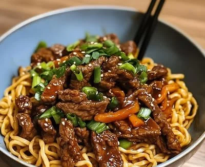 Bowl of Hoisin Beef Noodle with colorful vegetables and beef strips