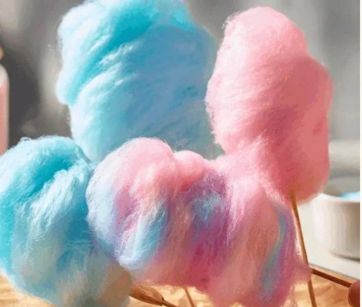 A colorful assortment of homemade cotton candy in various flavors and shapes.
