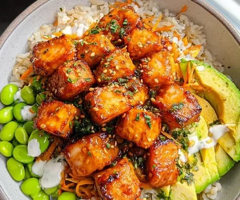 Air Fryer Salmon Bowl topped with spicy mayo and teriyaki sauce
