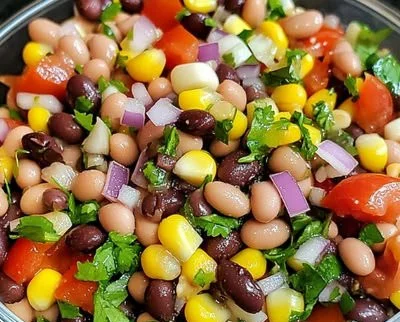Delicious Cowboy Caviar featuring 7 fresh ingredients served in a bowl.