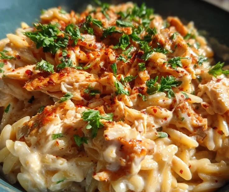 Creamy BBQ ranch chicken topped with white cheddar served over orzo.