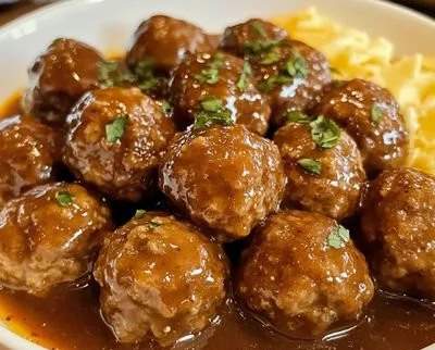 Crockpot Mississippi Meatballs ready to serve with savory sauce
