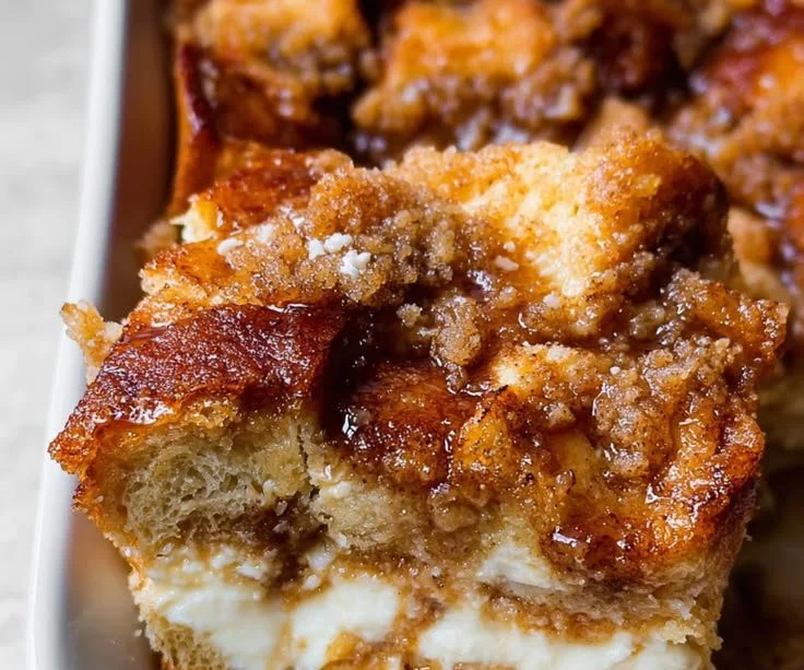 Delicious French toast casserole with cream cheese and cinnamon bread
