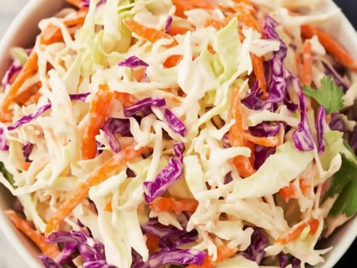 Juneteenth Sweet and Tangy Coleslaw Recipe in a vibrant bowl