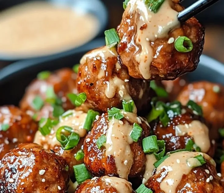 Korean BBQ Meatballs with Spicy Mayo Dip served on a plate