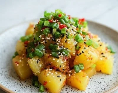 Bowl of creamy Korean Potato Salad with vegetables and mayonnaise