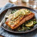 Delicious lemon garlic butter salmon served with herbs and sides